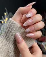 Frost Petals press-on nails — Sheer Nude Pink, Delicate White Snowflakes. handmade nail art by Joyee Nails