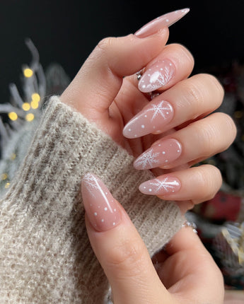 Frost Petals press-on nails — Sheer Nude Pink, Delicate White Snowflakes. handmade nail art by Joyee Nails