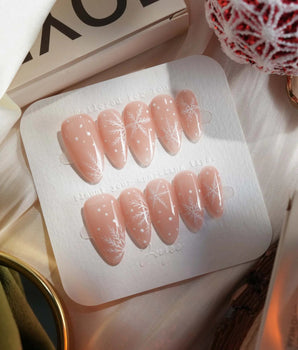 Frost Petals press-on nail set — Sheer Nude Pink, Delicate White Snowflakes. design, hand-painted with real gel polish