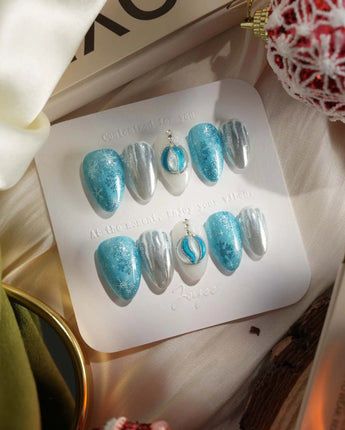 Frozen Dream press-on nails — ice blue ombre silver chrome snowflake charm handmade nail art by Joyee Nails