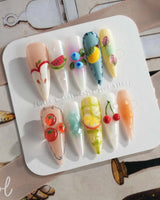 Fruit Picnic hand-painted fruit nails with soft pastels and glossy gel finish