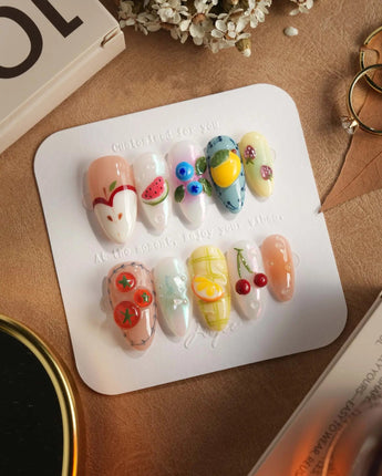 Fruit Picnic bright picnic-table nails with tiny 3D fruits and airy spacing