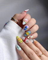 Fruit Picnic short almond nails with hand-painted fruits and barefoot summer mood