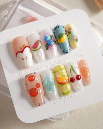 Fruit Picnic playful fruit nails with pastel gel polish and glossy 3D accents