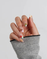 Fruit Tips hand-sculpted 3D fruit nail art with cherry, orange, and blueberry accents