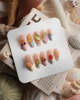 Fruit Tips nude press-on nails with translucent fruit jewels at the tips