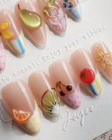 Fruit Tips short almond French tip nails with 3D cherries, pears, strawberries, and blueberries