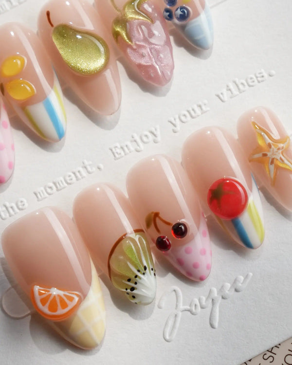 Fruit Tips short almond French tip nails with 3D cherries, pears, strawberries, and blueberries