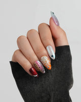 Funky Fish short almond press-on nails with bold coral reef fish characters