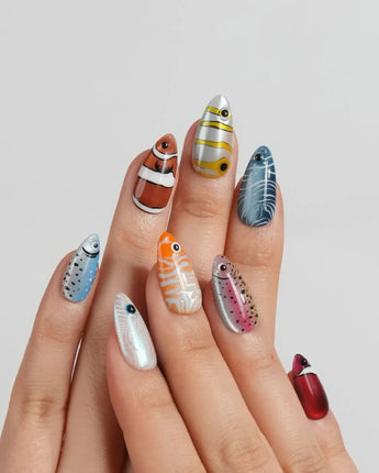 Funky Fish close-up of tropical fish press-on nails with raised googly eyes