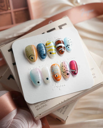 Funky Fish tropical fish press-on nails in extra short almond shape