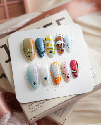Funky Fish tropical fish press-on nails in medium almond shape