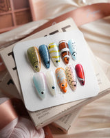 Funky Fish tropical fish press-on nails in medium stiletto shape
