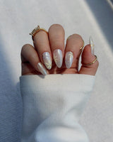 Garden Party handmade press-on nails featuring minimal floral french tip