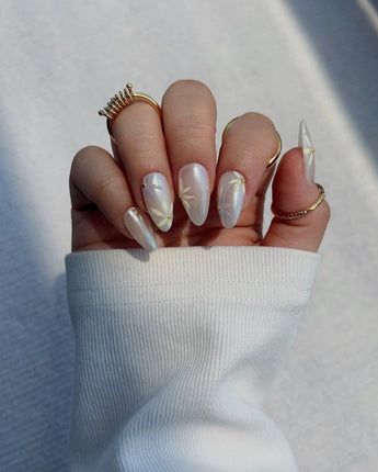 Garden Party handmade press-on nails featuring minimal floral french tip