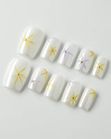 Garden Party press-on nails in short square shape — minimal floral french tip