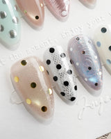 Gelato Dot custom-size short almond nails with playful metallic dot patterns