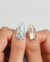 Gelato Dot short almond nails with candy-color gel polish and metallic spots