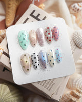 Gelato Dot medium almond press-on nails with shimmer and chrome dot details