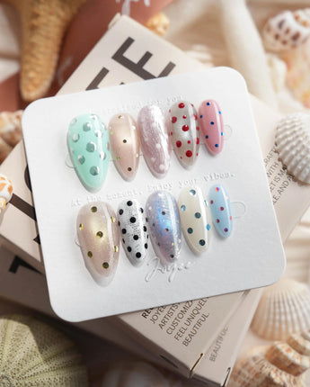 Gelato Dot medium almond press-on nails with shimmer and chrome dot details