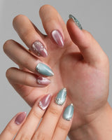 Gemstone Petals nail art close-up showing Contrast Morandi, Hand-painted Gold Leaf & Pearls. details