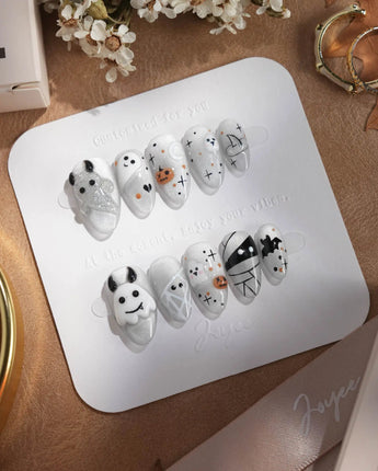 Ghost Coco press-on nails in extra short almond shape — Silver Glitter Halloween, 3D Ghost & Mummy.