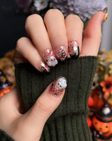 Ghost Kiki press-on nails in short oval shape — Orange & Black Halloween, 3D Pumpkin & Ghost Glitters.
