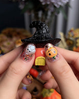 Ghost Kiki press-on nails in short oval shape — Orange & Black Halloween, 3D Pumpkin & Ghost Glitters.