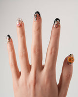 Ghost Kiki nail art close-up showing Orange & Black Halloween, 3D Pumpkin & Ghost Glitters. details