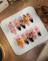 Ghost Kiki press-on nails in medium stiletto shape — Orange & Black Halloween, 3D Pumpkin & Ghost Glitters.