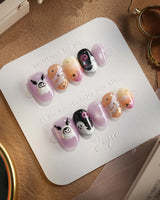 Ghost Kuromi nails — sheer nude pink base by Joyee Nails