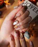 Ghost Portrait press on nails with ghosts in raised gold frames, gold filigree, pearls and a 3D copper pumpkin on copper cat eye - image 4