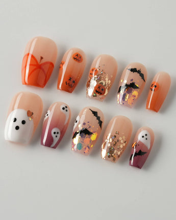 Ghostlight press-on nails in short coffin shape — Playful Halloween, Pumpkin & Ghost Glitters.