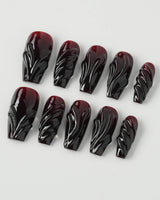 Ghoul Glam press-on nails in medium coffin shape — Dark Red & Black, 3D Liquid Flow.