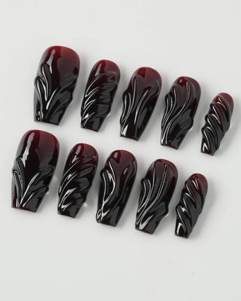 Ghoul Glam press-on nails in medium coffin shape — Dark Red & Black, 3D Liquid Flow.
