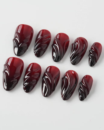 Ghoul Glam press-on nails in short almond shape — Dark Red & Black, 3D Liquid Flow.