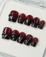 Ghoul Glam press-on nails in short coffin shape — Dark Red & Black, 3D Liquid Flow.