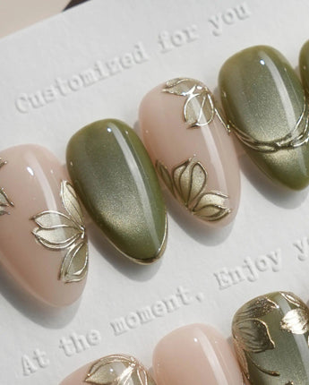Gilded Ivy press-on nails in short almond shape — Elegant Morandi Green, Metallic Relief Florals & Cat-eye Accents.