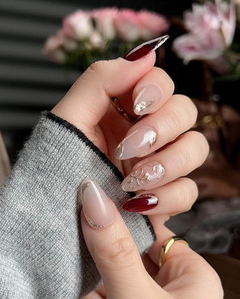 Gilded Rouge handmade press-on nails featuring Burgundy Amber, Embossed Gold Leaf.