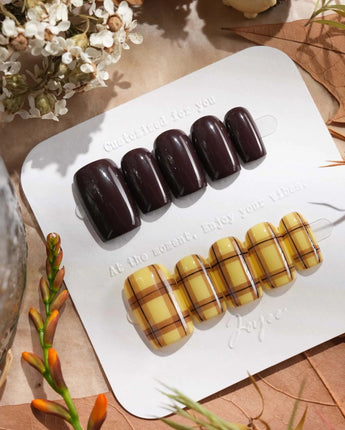 Ginger Plaid nail set with chocolate brown solids and bright yellow plaid accent nails