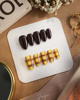 Ginger Plaid nail close-up with chocolate solids, lemon plaid accents, and glossy gel shine