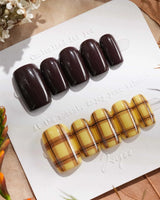 Ginger Plaid press-ons with glossy chocolate nails and warm yellow plaid fall accents