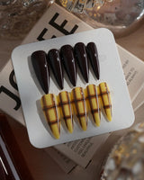 Ginger Plaid in long stiletto shape with dark brown color and lemon plaid nail art
