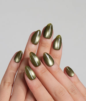 Glint Olive handmade press-on nails featuring olive green cat eye shimmer