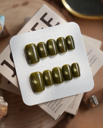 Glint Olive press-on nails in short coffin shape — olive green cat eye shimmer