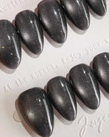 Glint Tahiti press-on nail set — gunmetal cat eye shimmer design, hand-painted with real gel polish