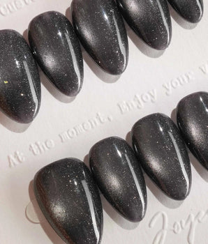 Glint Tahiti press-on nail set — gunmetal cat eye shimmer design, hand-painted with real gel polish