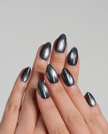 Glint Tahiti handmade press-on nails featuring gunmetal cat eye shimmer