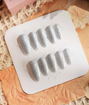 Glitter Frost press-on nail set — silver glitter design, hand-painted with real gel polish