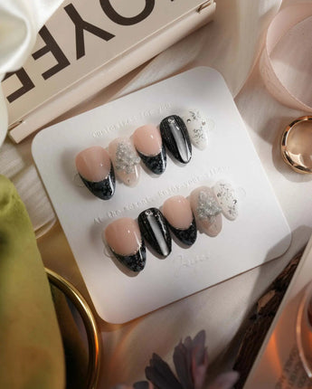 Glitter Gala nails in extra short almond — Black & Gray with